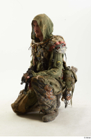  Photos John Hopkins Army Postapocalyptic Suit Poses kneeling whole body 0002.jpg